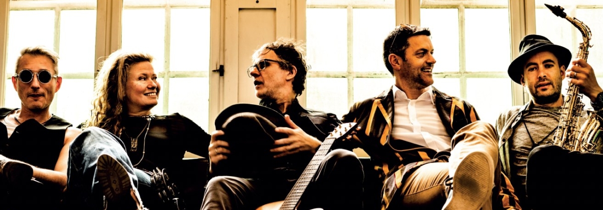 Red Lake band on sofa